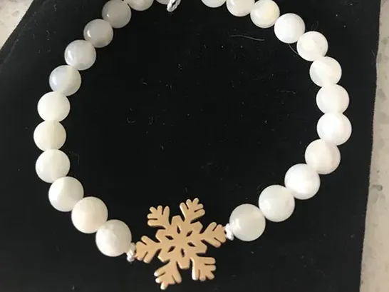 The UAE Jewelry Designer Purchases 50W Fiber Laser Marking Machine