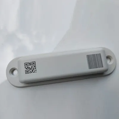 Black marking on white plastic